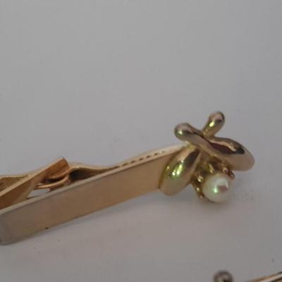 Men's mother of pearl ring, bowling award swank marked tie clips, and cuff links