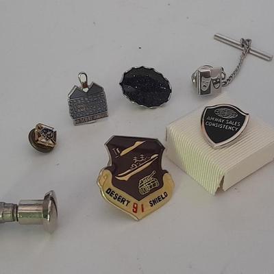 Hat pins, Desert 91 shield, Amway award, Bowling score award, K of C Knights of Columbus