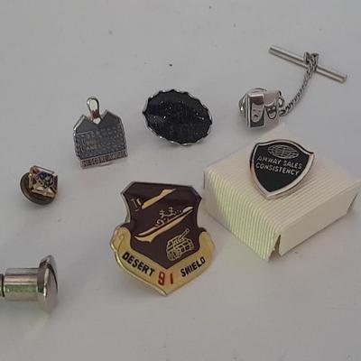 Hat pins, Desert 91 shield, Amway award, Bowling score award, K of C Knights of Columbus