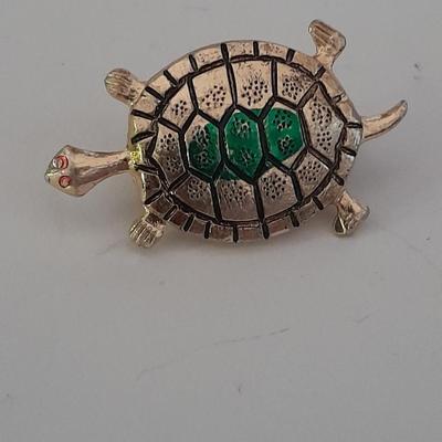 Four Fun and fancy hat pins, Roadrunner, Turtle, Frog, and a Clown
