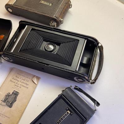 Three Antique Cameras