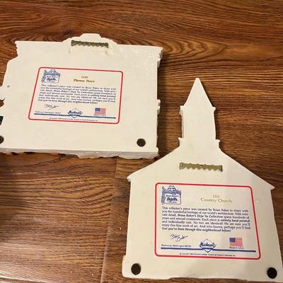 Brian Bakerâ€™s collection. Plaques:  1145 Flower Store and 1522 Country Church. Lot 2