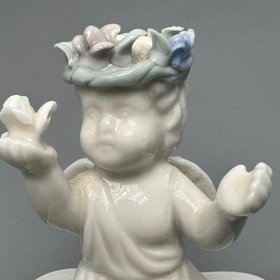 Small Heart Shaped Porcelain Trinket with Angel Cherub Sitting On Top Wearing Flower Crown