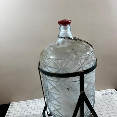 Unique old 5 Gallon Glass Water Jug on Tippy Stand 