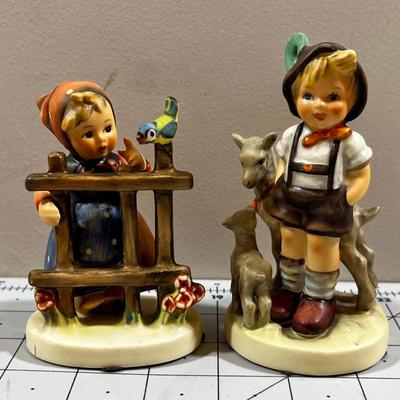 2 Hummel Figurines; Girl with Blue Bird and Boy with goats