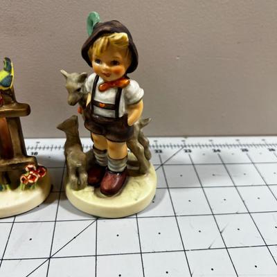 2 Hummel Figurines; Girl with Blue Bird and Boy with goats