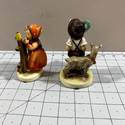 2 Hummel Figurines; Girl with Blue Bird and Boy with goats