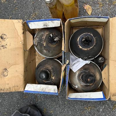 Lot 703. Set of Four Patio Torches with Fuel