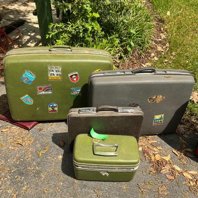 Lot 705 Lot of Four Vintage Hard-case Suitcases