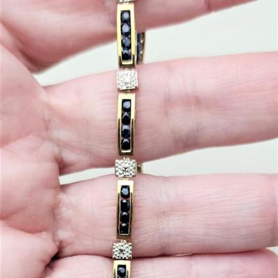 Lot #202J  14kt Yellow Gold Bracelet set with small Sapphires and Diamonds