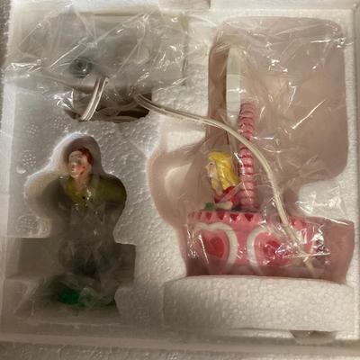 Department 56, Kisses 25 Cents. Lighted