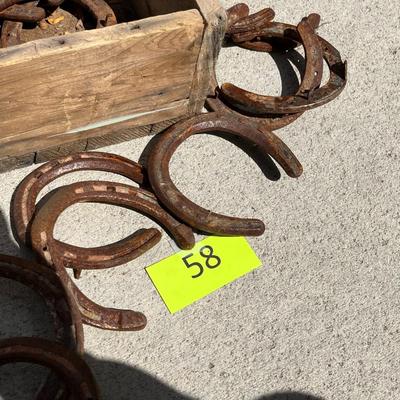 Wood Box full of horse shoes