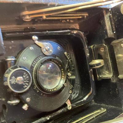 Two antique cameras.