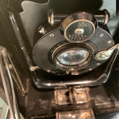 Two antique cameras.
