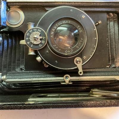 Two antique cameras.