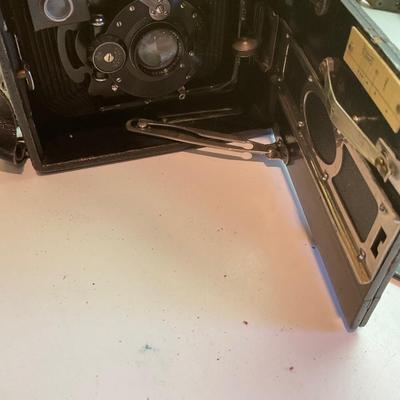 Two antique cameras.