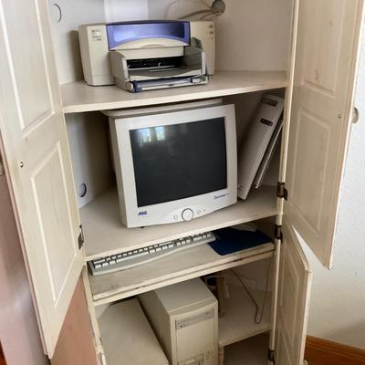 Corner Cabinet with shelves.