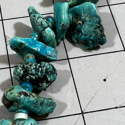 String of Turquois Beads on Thread 