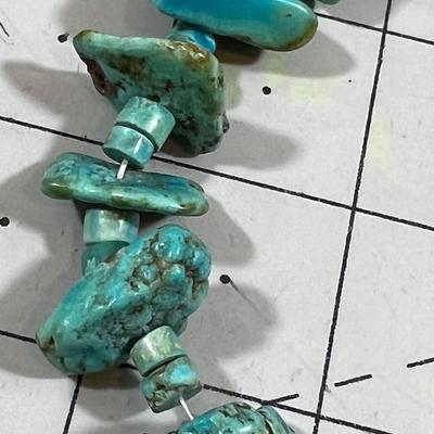 String of Turquois Beads on Thread 