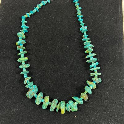 String of Turquois Beads on Thread 