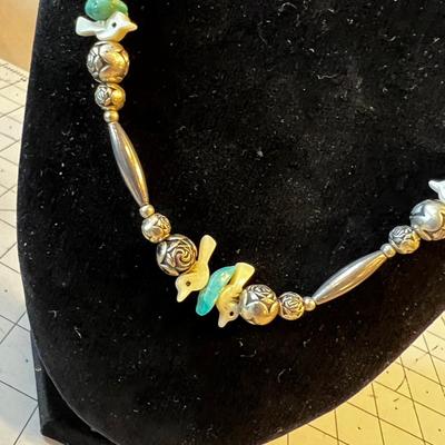 Liquid Silver with Turquoise beads,  Mother-of-Pearl Bird and Rose Silver Beads 