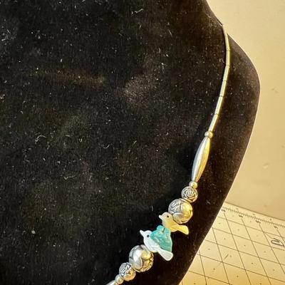Liquid Silver with Turquoise beads,  Mother-of-Pearl Bird and Rose Silver Beads 