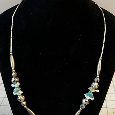 Liquid Silver with Turquoise beads,  Mother-of-Pearl Bird and Rose Silver Beads 