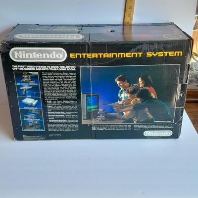 Vintage Nintendo Entertainment center with Eight Games, Rob Robot, Gun, AND MORE