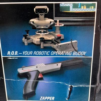 Vintage Nintendo Entertainment center with Eight Games, Rob Robot, Gun, AND MORE