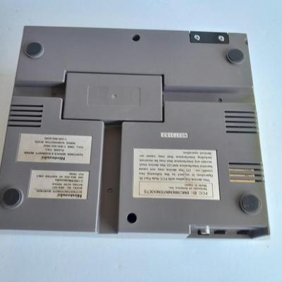Vintage Nintendo Entertainment center with Eight Games, Rob Robot, Gun, AND MORE