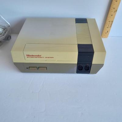 Vintage Nintendo Entertainment center with Eight Games, Rob Robot, Gun, AND MORE