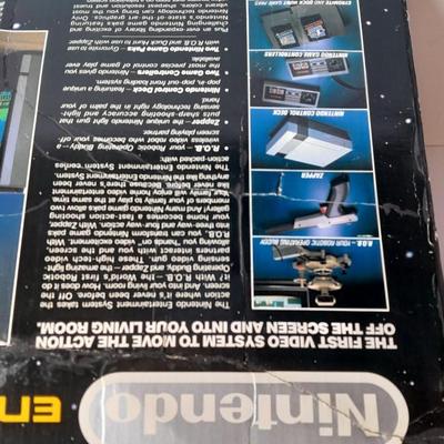 Vintage Nintendo Entertainment center with Eight Games, Rob Robot, Gun, AND MORE