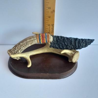 Limited Edition Red tail hawk with arrowhead, and a faux knife on an antler