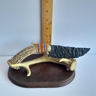 Limited Edition Red tail hawk with arrowhead, and a faux knife on an antler