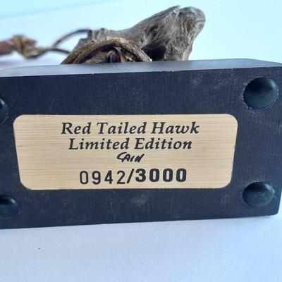 Limited Edition Red tail hawk with arrowhead, and a faux knife on an antler