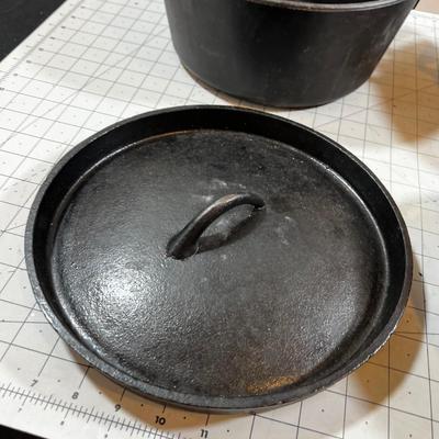 Last of the Cast Iron Lot: 2 Dutch, 1 Deep Skillet and 1 Random Lid. 
