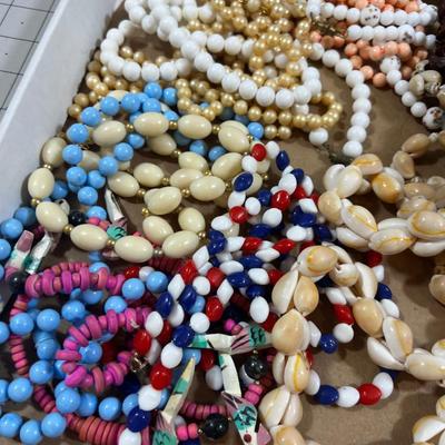 Tray of Beaded things; Shells, Apple Seeds, Beaded Necklaces ETC.> 