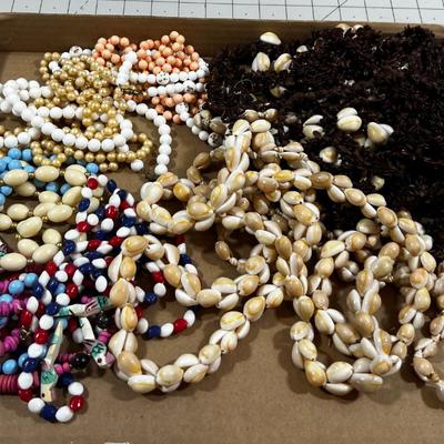 Tray of Beaded things; Shells, Apple Seeds, Beaded Necklaces ETC.> 