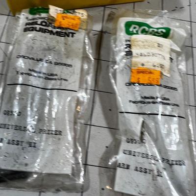 Several RCBS Universal Primer Arm Assembly 