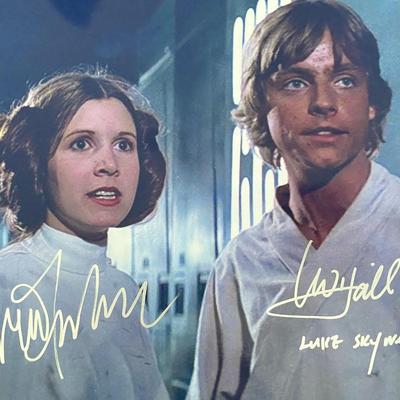 Star Wars Carrie Fisher and Mark Hamill signed movie photo. GFA Authenticated