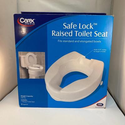 NEW Unused Safe Lock Raised Toilet Seat from Carex in Original Box