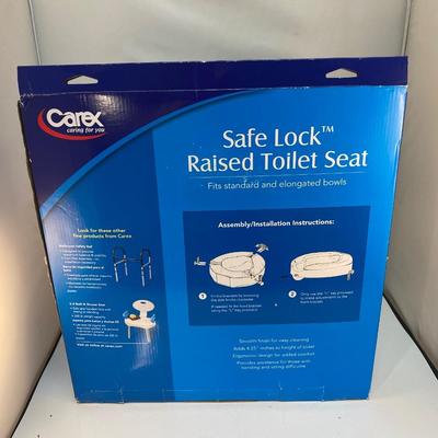 NEW Unused Safe Lock Raised Toilet Seat from Carex in Original Box