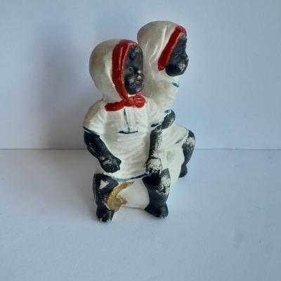 Cast Iron Mammy coin bank with porcelain figures, and metal bell