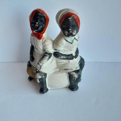 Cast Iron Mammy coin bank with porcelain figures, and metal bell