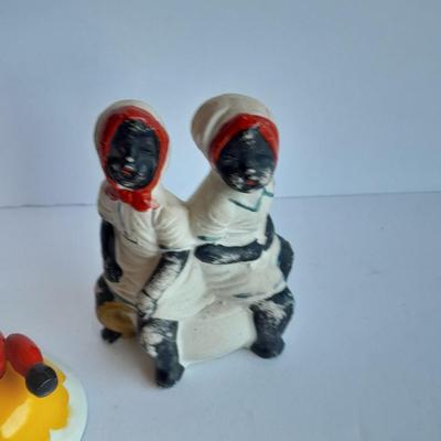 Cast Iron Mammy coin bank with porcelain figures, and metal bell