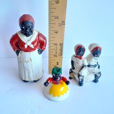 Cast Iron Mammy coin bank with porcelain figures, and metal bell