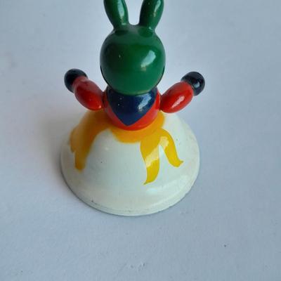 Cast Iron Mammy coin bank with porcelain figures, and metal bell