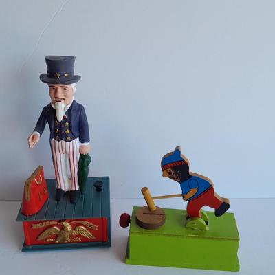 Uncle Sam coin bank and wooden coin bank with movement