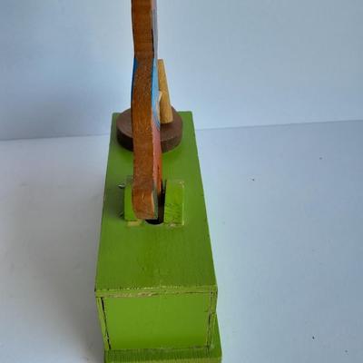 Uncle Sam coin bank and wooden coin bank with movement