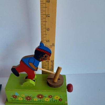 Uncle Sam coin bank and wooden coin bank with movement